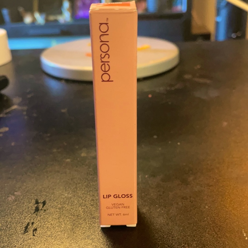 Persona lip gloss in the colour Honey